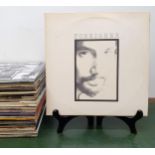 Cat Stevens, Foreigner, vinyl LP record, and assorted other vinyl records Provenance: From a large