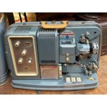 A Microtecnica portable projector, assorted other projectors and related items (qty) Provenance: