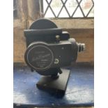 An Ensign Auto Kimacam cine camera, assorted other cine cameras, tripods and related items (qty)