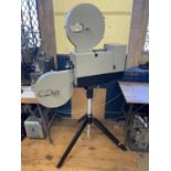 A Spectra 90 cinema projector on a tripod base, 175 x 106 cm Provenance: From a vast single owner