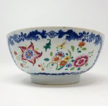 A Chinese blue and white and famille rose bowl, 26 cm diameter cracked and repaired, wear to