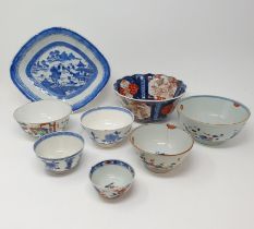A Chinese blue and white cup, 9 cm diameter, six bowls, and an oval plate (8) Various losses