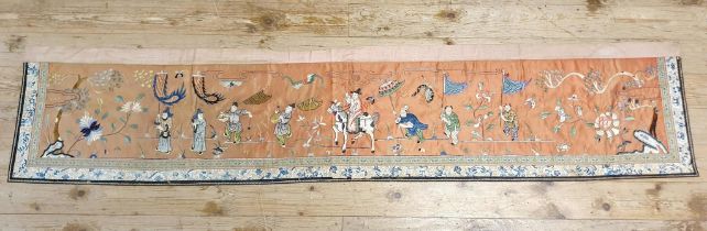 A Chinese embroidered silk panel, decorated birds and foliage 208 x 38 cm
