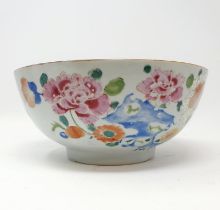 A Chinese famille rose bowl, decorated flowers, 22 cm diameter wear to decoration, most noticeable