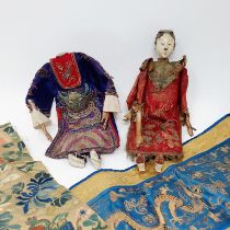 A Chinese embroidered sleeve, another, and two dolls (4)