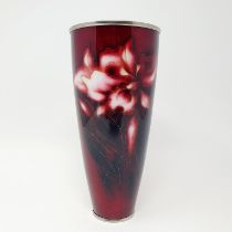 A Japanese silver coloured metal and cloisonné vase, decorated flowers on a red ground, 22 cm high