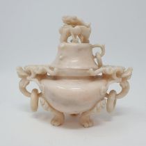 A Chinese carved soapstone censer and cover, 16 cm high Various losses