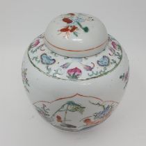 A Chinese ginger jar, the central cartouche decorated chickens, 22 cm high heavy ware to decoration,