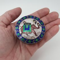 An Eastern silver coloured coloured metal and enamel box, decorated an elephant, 6 cm diameter