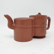 A Chinese red pottery teapot, 22 cm wide no chips, cracks or restoration, lid is slightly loose when