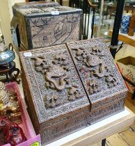 A Chinese desk stand, decorated dragons, 43 cm, two boxes, a carved panel, and assorted horses (qty)