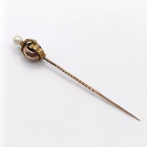 A late 19th/early 20th century yellow metal and cultured pearl stick pin Provenance: From a single