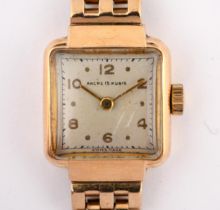 A ladies 9ct gold bracelet wristwatch, with additional loose links 26.5 g all in