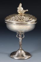 A silver bowl, with a pierced cover, having a bird finial, Edinburgh 1930, 6.1 ozt, 15.5 cm high