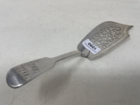 An early Victorian silver fiddle pattern fish slice, initialed, London 1838, 4.5 ozt