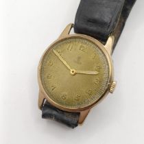 A gentleman's 9ct gold Tudor wristwatch, on a leather strap in need of restoration