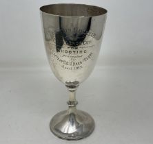 A silver trophy cup, with a presentation inscription dated 1913