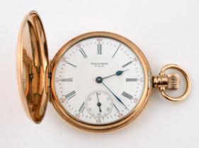 A 9ct gold Waltham hunter pocket watch, the enamel dial with Roman numerals 95.3 g (all in)