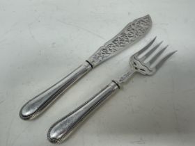 A pair of Victorian silver servers, Sheffield 1873, handles filled