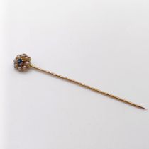 A late 19th/early 20th century yellow metal, sapphire and pearl stick pin Provenance: From a