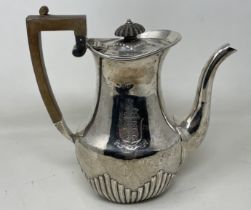 A Victorian silver coffee pot, with a wooden handle, London 1892, all in 15.2 ozt