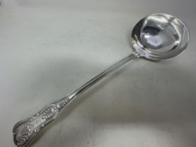 An Edward VII silver shell pattern punch ladle, London 1902, 10.2 ozt