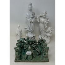 A Chinese Blanc de Chine figure of a goddess, 32 cm high, two other figures and a green glazed