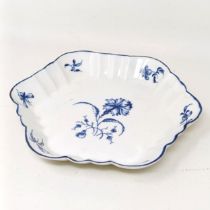 An 18th century blue and white shaped dish, decorated flowers, W mark to base, 13 cm diameter