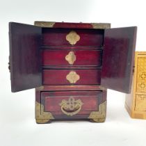 A Chinese jewellery box, the doors inset with green stone, 25 cm high, and another box (2)