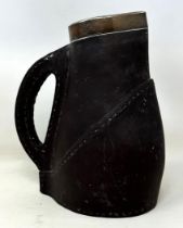 A Royal Doulton faux leather jug, with a silver mount