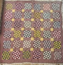 A 1920s patchwork quilt, 185 x 185 cm Overall condition good light ware,