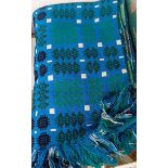 A blue ground Welsh blanket, and another similar (2)