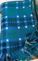 A blue ground Welsh blanket, and another similar (2)