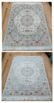 A pair of Persian part silk rugs, 205 x 150 cm (2)