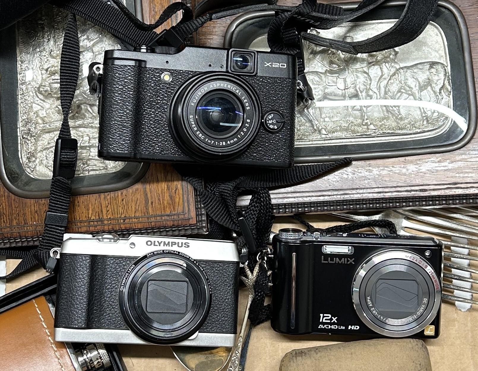 A Fujifilm X20 camera, an Olympus Optical 5-Axis IS camera, another camera, a pair of silver - Image 2 of 2