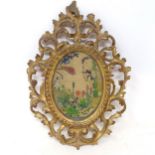An unusual embroidered panel, decorated lead figures, in a Florentine style frame, 27 x 20 cm Some
