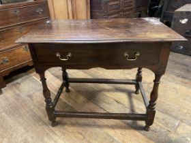 An oak sidetable, 85 cm wide, a Sutherland table, a nest of tables, and a coffee table (4)