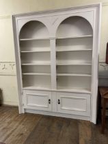 A painted bookcase, 230 cm high x 185 cm wide Probably MDF, structurally sound, but was never made