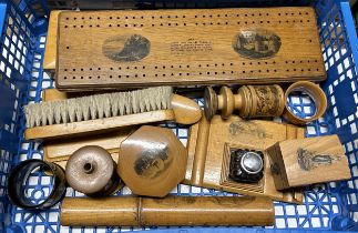 A 19th century Mauchline ware cribbage board, 33 cm wide, other Mauchline ware, and a Tunbridge ware