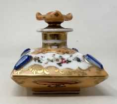 A 19th century Continental inkwell, the peach ground decorated flowers, 10 cm wide