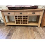 A modern light oak dresser base, 186 cm wide, and a corner cabinet (2)