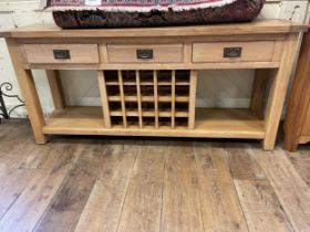 A modern light oak dresser base, 186 cm wide, and a corner cabinet (2)