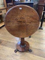 A mahogany tilt top table, 60 cm diameter, and an oak cupboard (2)
