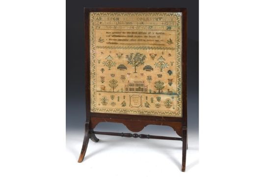 A 19th century sampler, worked by Elizabeth Clark, dated 1840, made into a fire screen, 51 x 58 cm