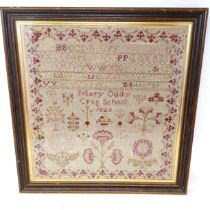 A 19th century sampler, worked by Mary Oddy dated 1828, 41 x 39 cm Some losses most notable to