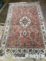 A Persian Tabriz rug, 230 x 140 cm