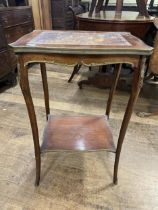 A French side table, with a tooled leather top and gilt metal mounts, 50 cm wide Leather top very