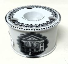 A Davenport transfer printed inkwell, decorated Tunstall Methodist Chapel dated 1860, 9 cm diameter