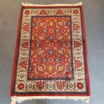 An Azerbaijan red ground rug, 145 x 107 cm Overall good, minor wear