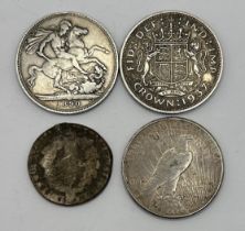 A Victorian crown, 1890, a George V crown, 1937, an American silver dollar, and a Louis XVI coin,